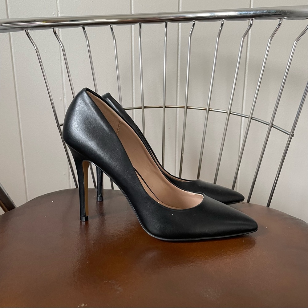 Black pointed toe heels